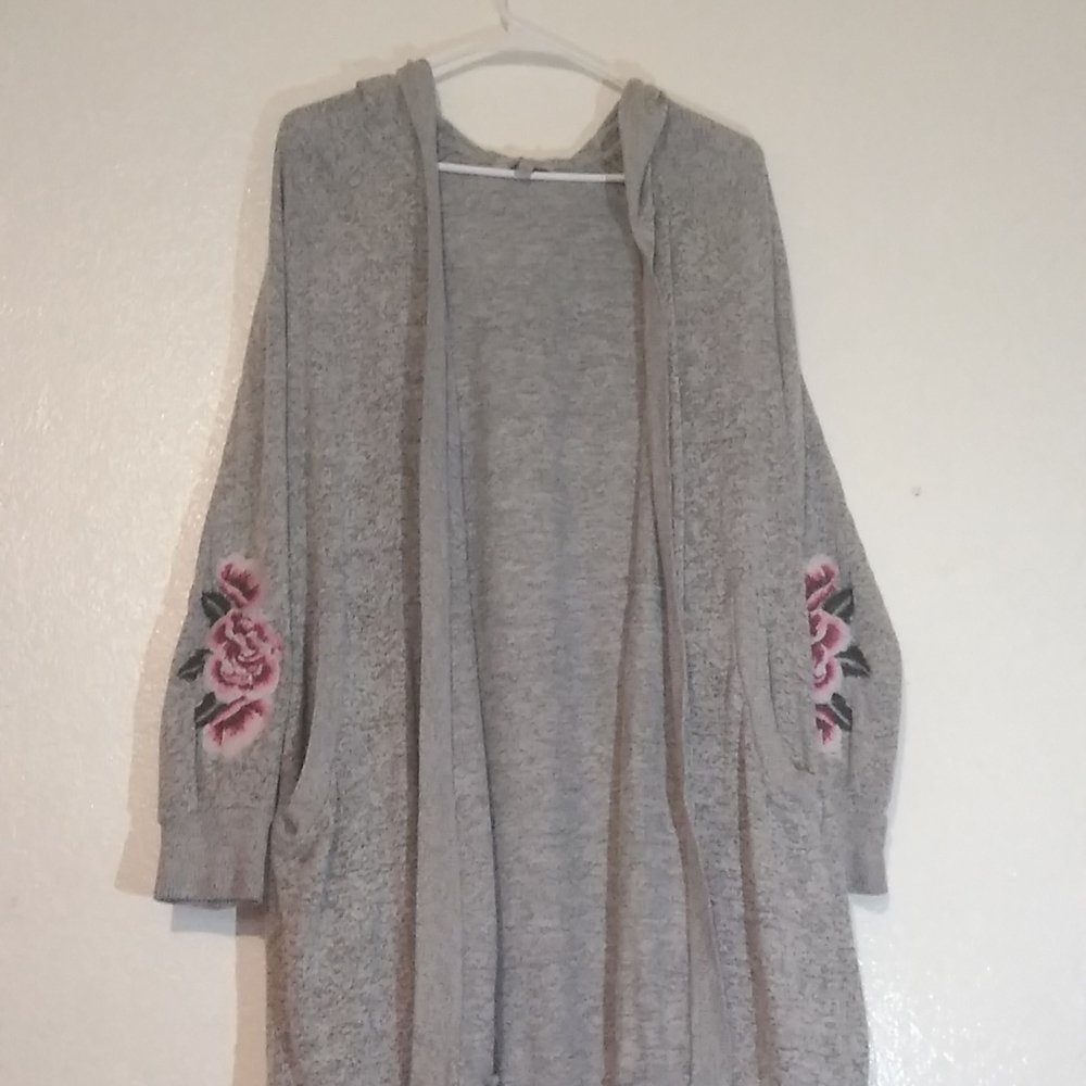 A grey floral sleeved cardigan with hood